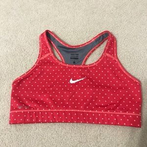 Red patterned Nike sports bra